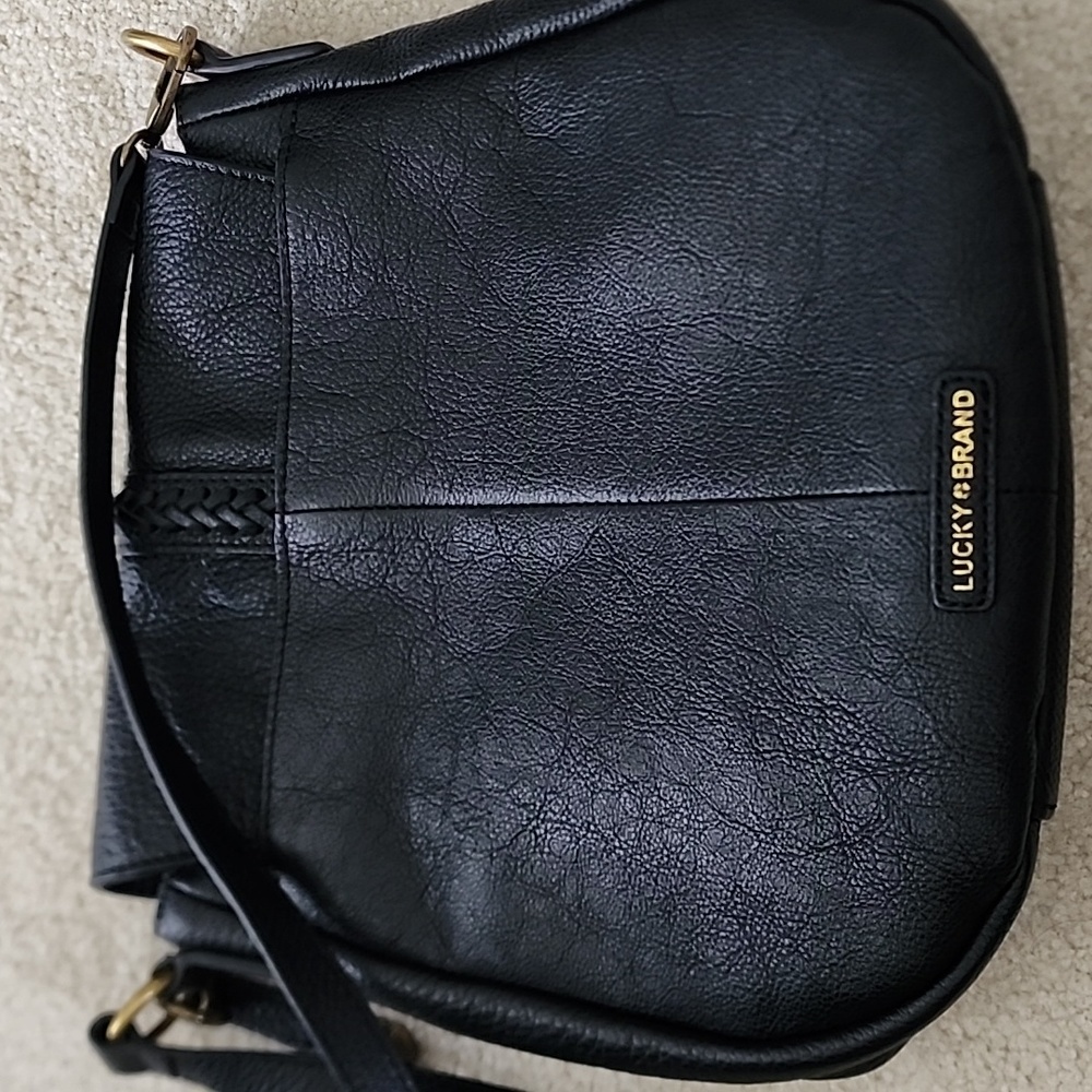 Lucky Brand black leather purse with magnetic tassle closure. It is 10"x10". - Picture 6 of 7